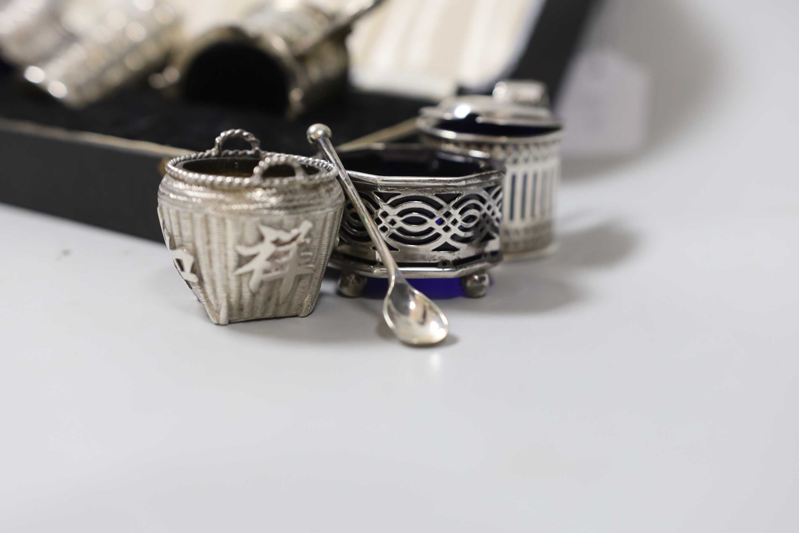A modern cased silver three piece condiment set, a similar Danish enamelled sterling set (a.f.) and three other condiments including Chinese.
